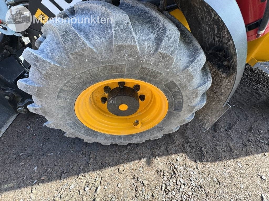 Kolesový nakladač JCB 409: obrázok 11