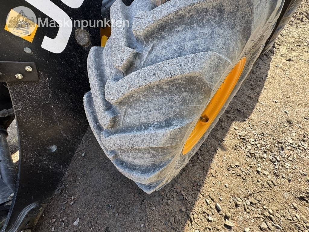 Kolesový nakladač JCB 409: obrázok 10