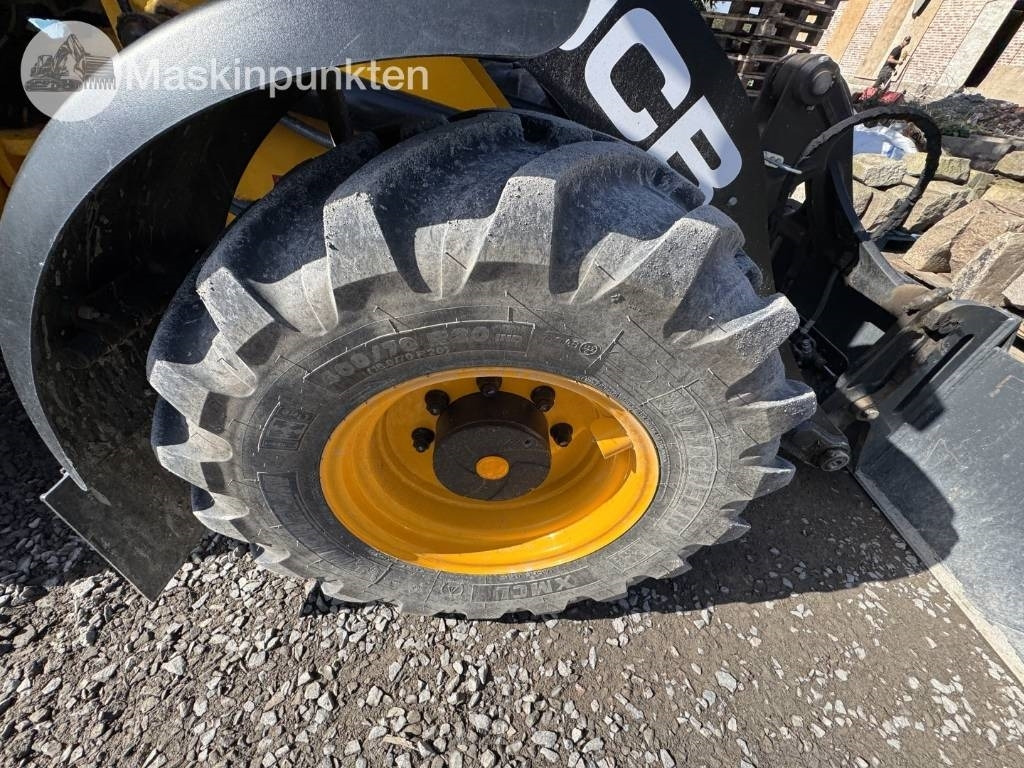 Kolesový nakladač JCB 409: obrázok 35