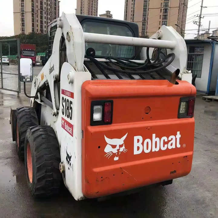 Used Bob Cat Bob Cat S185 Used Mini Skid Steer Wheel Loader Multifunctional Track Loaders Bobcat - Šmykom riadený nakladač: obrázok 1 Used Bob Cat Bob Cat S185 Used Mini Skid Steer Wheel Loader Multifunctional Track Loaders Bobcat - Šmykom riadený nakladač: obrázok 1