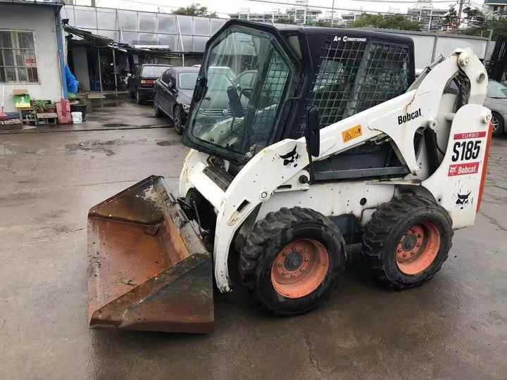 Used Bob Cat Bob Cat S185 Used Mini Skid Steer Wheel Loader Multifunctional Track Loaders Bobcat - Šmykom riadený nakladač: obrázok 3 Used Bob Cat Bob Cat S185 Used Mini Skid Steer Wheel Loader Multifunctional Track Loaders Bobcat - Šmykom riadený nakladač: obrázok 3