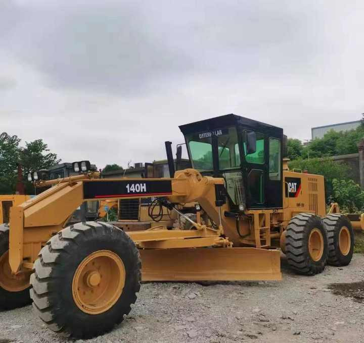 Used CAT 140H Motor Grader From Japan with Excellent Performance Caterpillar 140h in Good Condition for Sale - Zrovnávač: obrázok 1 Used CAT 140H Motor Grader From Japan with Excellent Performance Caterpillar 140h in Good Condition for Sale - Zrovnávač: obrázok 1