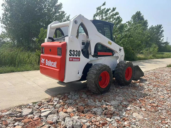 The Best Selling Used Construction Machinery in USA Bobcat S330 Loader High Quality and Cheap Price - Šmykom riadený nakladač: obrázok 3 The Best Selling Used Construction Machinery in USA Bobcat S330 Loader High Quality and Cheap Price - Šmykom riadený nakladač: obrázok 3