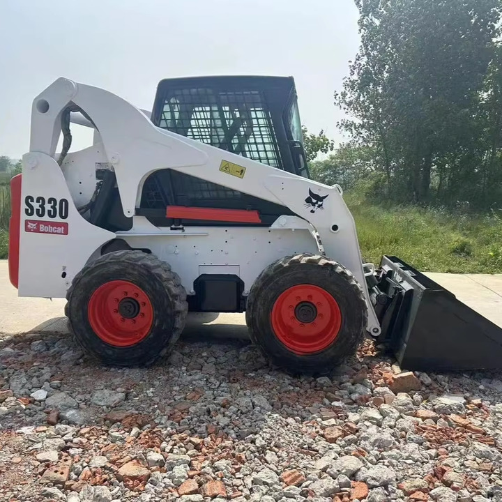 The Best Selling Used Construction Machinery in USA Bobcat S330 Loader High Quality and Cheap Price - Šmykom riadený nakladač: obrázok 1 The Best Selling Used Construction Machinery in USA Bobcat S330 Loader High Quality and Cheap Price - Šmykom riadený nakladač: obrázok 1