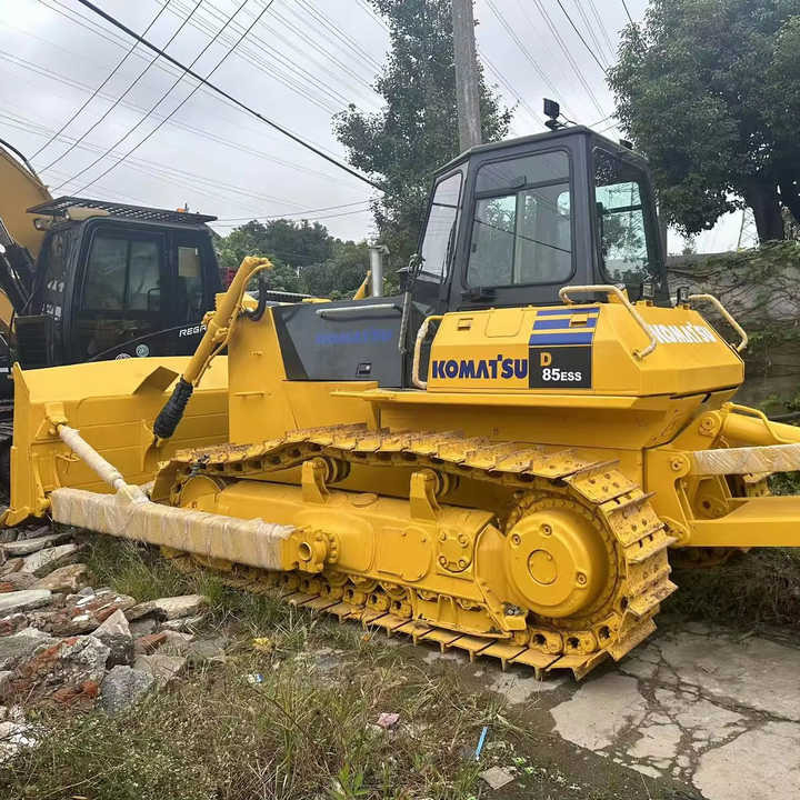 Used Japan Komatsu D85ESS Dozer with Ripper Komatsu D85 Crawler Bulldozer with Excellent Performance Low Price for Sale - Buldozér: obrázok 1 Used Japan Komatsu D85ESS Dozer with Ripper Komatsu D85 Crawler Bulldozer with Excellent Performance Low Price for Sale - Buldozér: obrázok 1