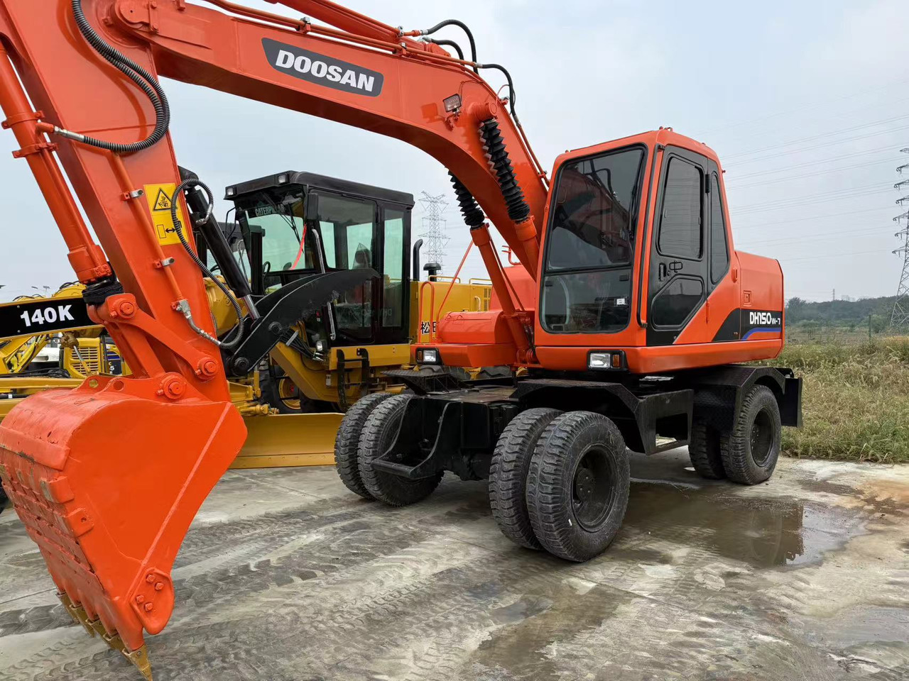 DOOSAN DH150W-7 - Kolesové rýpadlo: obrázok 1 DOOSAN DH150W-7 - Kolesové rýpadlo: obrázok 1