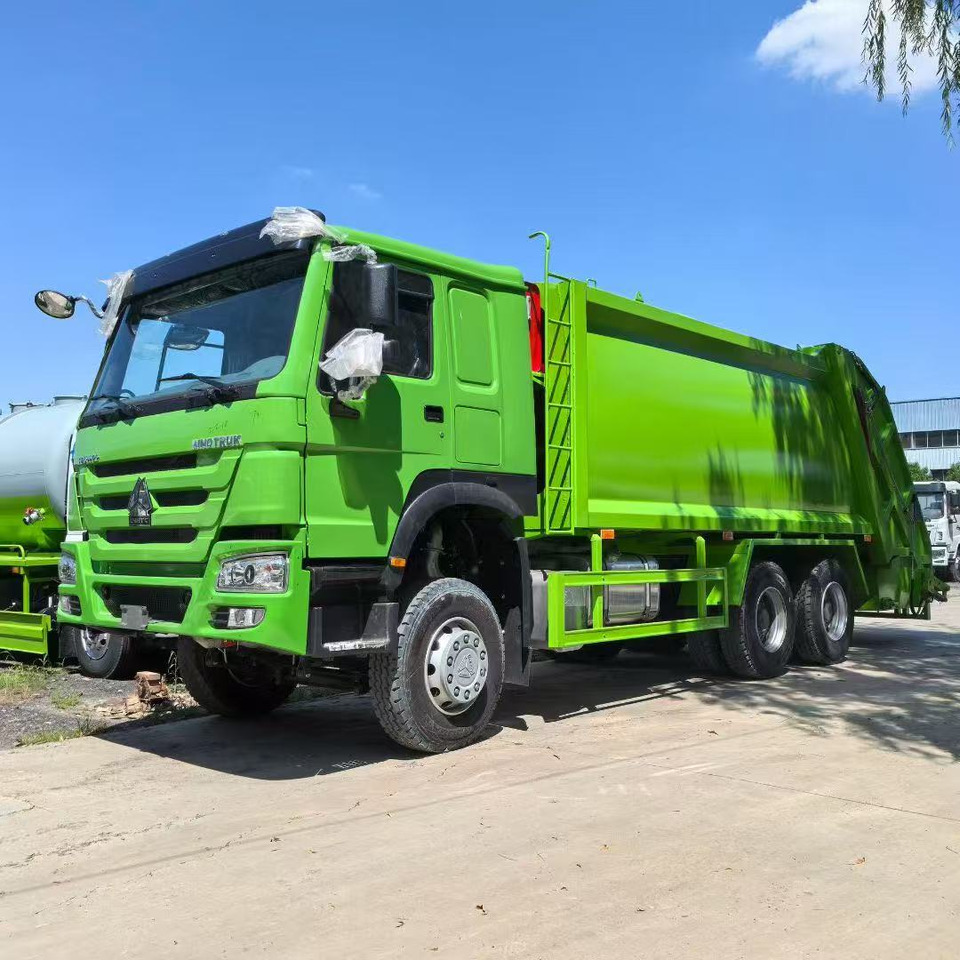 HOWO Garbage Truck Click Here for Discount - Auto na odvoz odpadu: obrázok 1 HOWO Garbage Truck Click Here for Discount - Auto na odvoz odpadu: obrázok 1