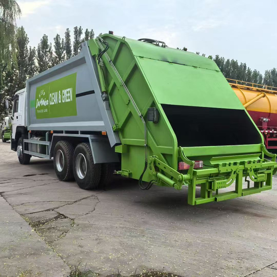 HOWO Garbage Truck Click Here for Discount - Auto na odvoz odpadu: obrázok 4 HOWO Garbage Truck Click Here for Discount - Auto na odvoz odpadu: obrázok 4