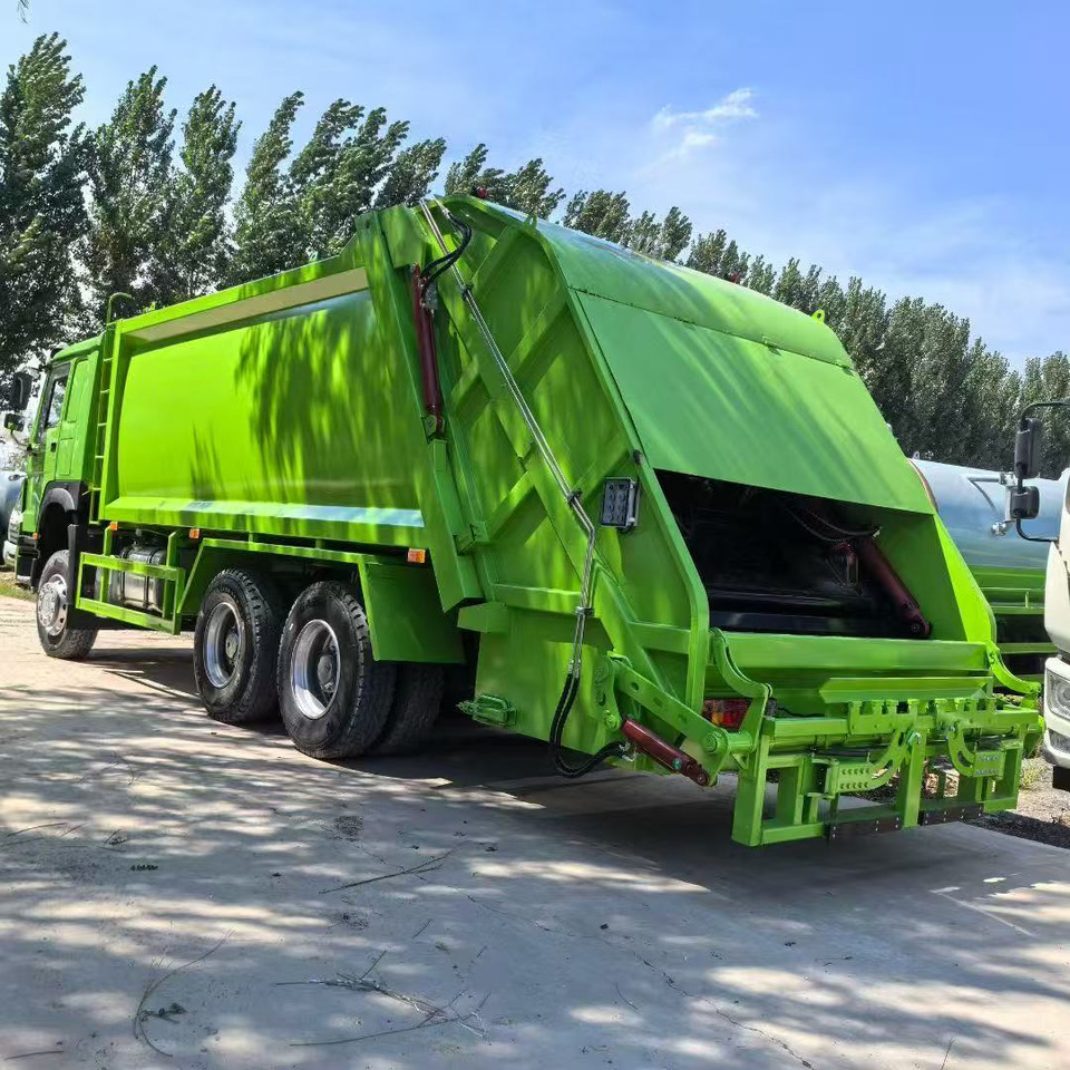 HOWO Garbage Truck Click Here for Discount - Auto na odvoz odpadu: obrázok 4 HOWO Garbage Truck Click Here for Discount - Auto na odvoz odpadu: obrázok 4