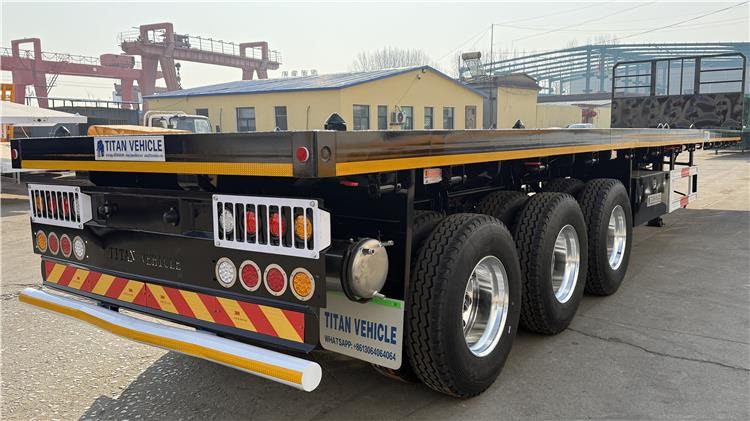 TITAN 12.5M 3 Axle Flat Deck Trailer for Sale In Tanzania - Náves preprava kontajnerov/ Výmenná nadstavba: obrázok 3 TITAN 12.5M 3 Axle Flat Deck Trailer for Sale In Tanzania - Náves preprava kontajnerov/ Výmenná nadstavba: obrázok 3