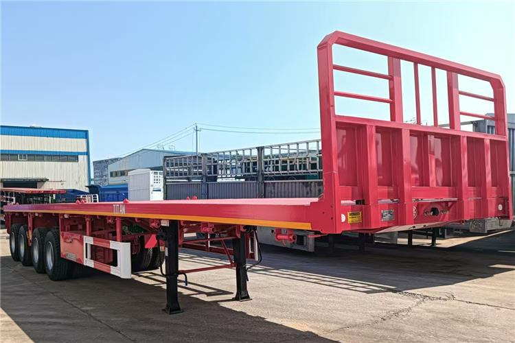 TITAN 4 Axle Shipping Container Flatbed Trailer For Sale In Lagos - Náves preprava kontajnerov/ Výmenná nadstavba: obrázok 2 TITAN 4 Axle Shipping Container Flatbed Trailer For Sale In Lagos - Náves preprava kontajnerov/ Výmenná nadstavba: obrázok 2