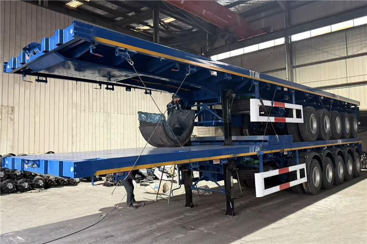TITAN 5 Axle Flatbed Semi Trailer for Sale In Aruba - Plošinový/ Valníkový náves: obrázok 4 TITAN 5 Axle Flatbed Semi Trailer for Sale In Aruba - Plošinový/ Valníkový náves: obrázok 4