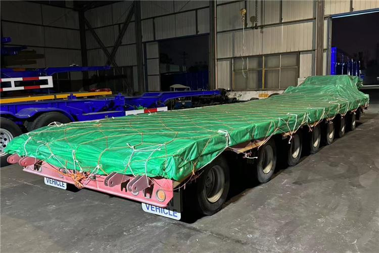 TITAN 7 Axle 120 Ton Lowbed Trailer for Sale In Saudi Arabia - Náves podvalník: obrázok 5 TITAN 7 Axle 120 Ton Lowbed Trailer for Sale In Saudi Arabia - Náves podvalník: obrázok 5