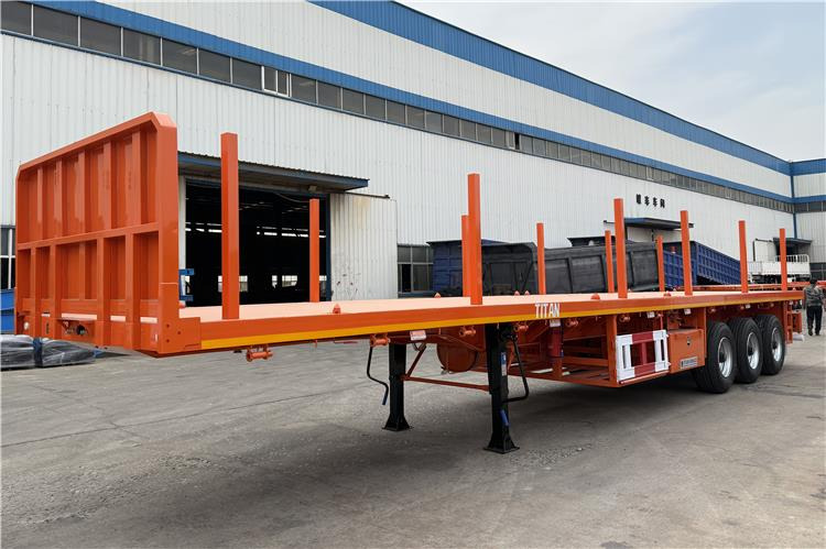 TITAN Container Flatbed Truck Trailer with Piles In Angola - Náves preprava kontajnerov/ Výmenná nadstavba: obrázok 2 TITAN Container Flatbed Truck Trailer with Piles In Angola - Náves preprava kontajnerov/ Výmenná nadstavba: obrázok 2