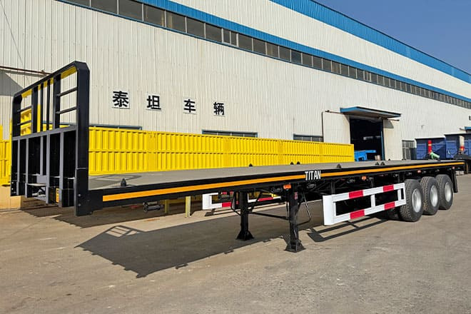 TITAN Tri Axle Flatbed Trailer for Sale in Jamaica - Plošinový/ Valníkový náves: obrázok 1 TITAN Tri Axle Flatbed Trailer for Sale in Jamaica - Plošinový/ Valníkový náves: obrázok 1