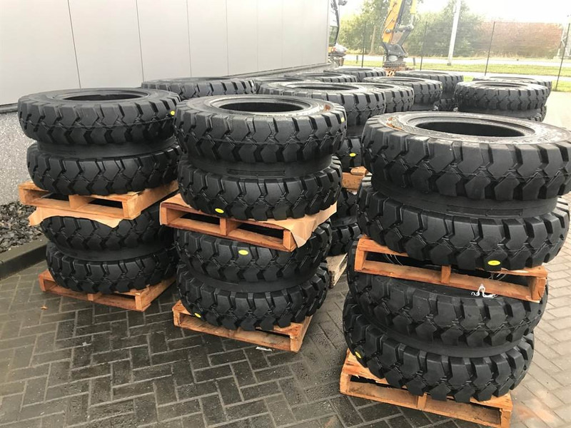Trelleborg 10.00-20 Dual excavator solid-Tyre/Reifen/Banden - Pneumatiky a disky pre Stavebné stroje: obrázok 1 Trelleborg 10.00-20 Dual excavator solid-Tyre/Reifen/Banden - Pneumatiky a disky pre Stavebné stroje: obrázok 1