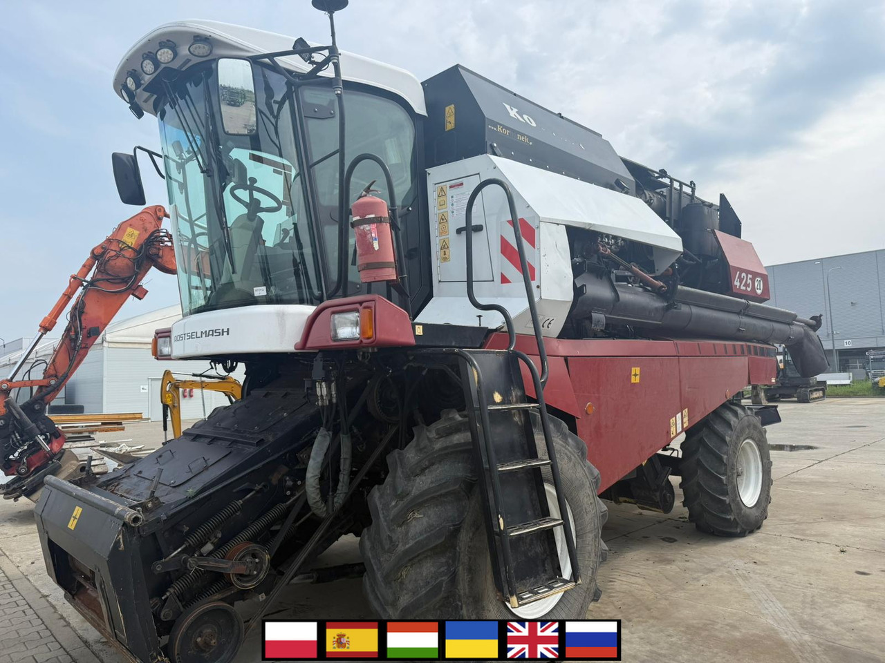 ROSTSELMASH VECTOR 425 RSM-101 grain harvester + Header 5 m + rapeseed harvesting extension / 2300 MTH - Obilný kombajn: obrázok 1 ROSTSELMASH VECTOR 425 RSM-101 grain harvester + Header 5 m + rapeseed harvesting extension / 2300 MTH - Obilný kombajn: obrázok 1