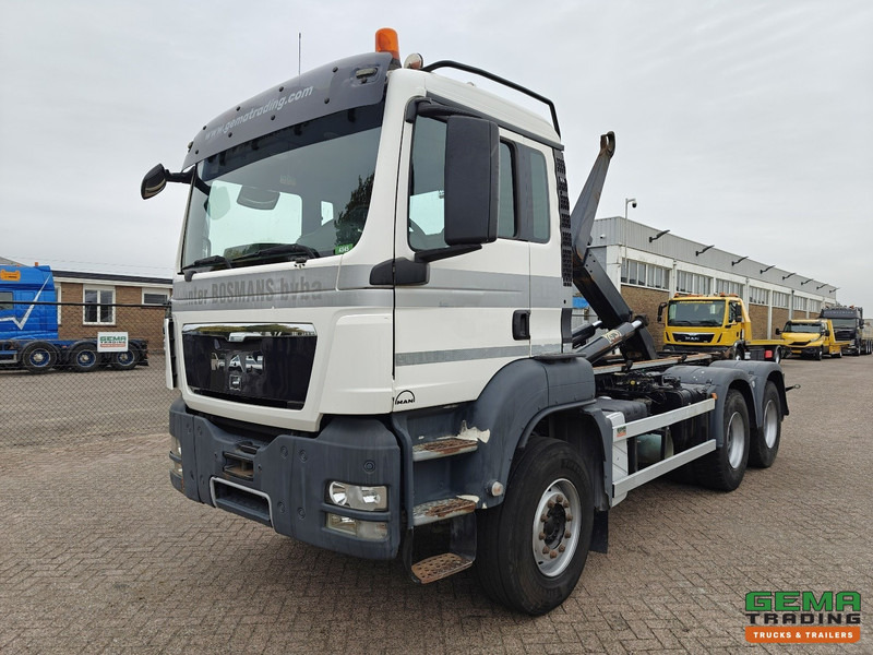 MAN TGS-TGX 26.440 6x4 Dagcabine Euro5 - AJK 20T HaakarmSysteem - Volledig Bladgeveerd - Naafreductie - Handgeschakeld - Hákový nosič kontajnerov: obrázok 1 MAN TGS-TGX 26.440 6x4 Dagcabine Euro5 - AJK 20T HaakarmSysteem - Volledig Bladgeveerd - Naafreductie - Handgeschakeld - Hákový nosič kontajnerov: obrázok 1