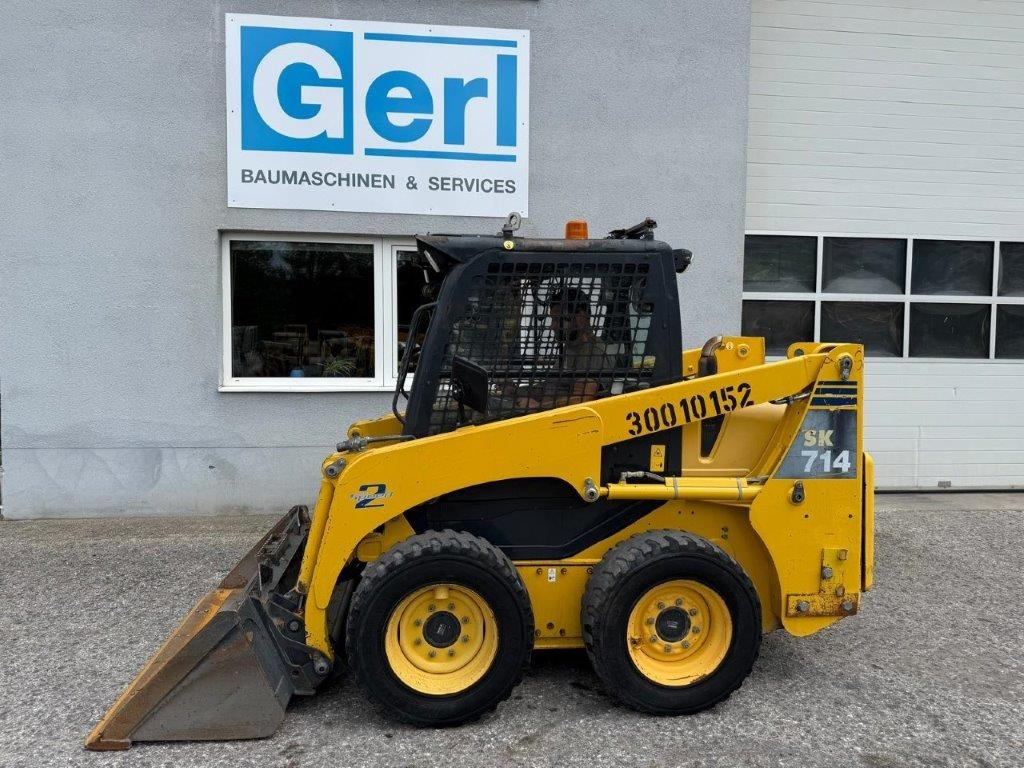 Komatsu SK714-5 (4026) - Šmykom riadený nakladač: obrázok 2 Komatsu SK714-5 (4026) - Šmykom riadený nakladač: obrázok 2