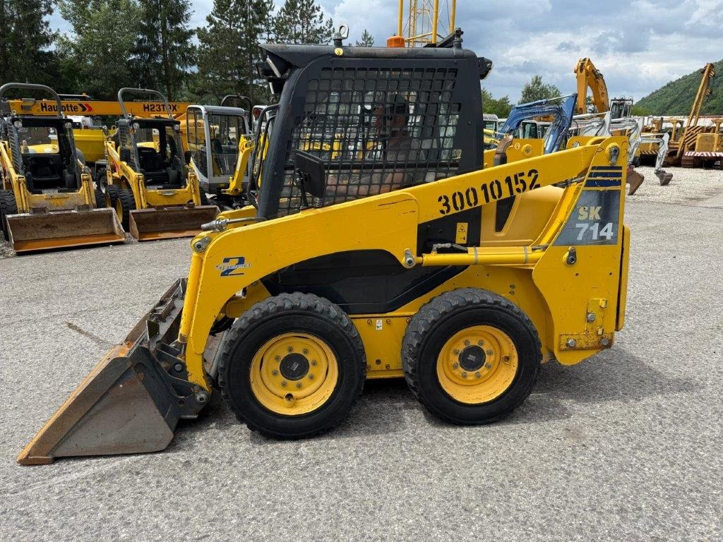Komatsu SK714-5 (4026) - Šmykom riadený nakladač: obrázok 1 Komatsu SK714-5 (4026) - Šmykom riadený nakladač: obrázok 1