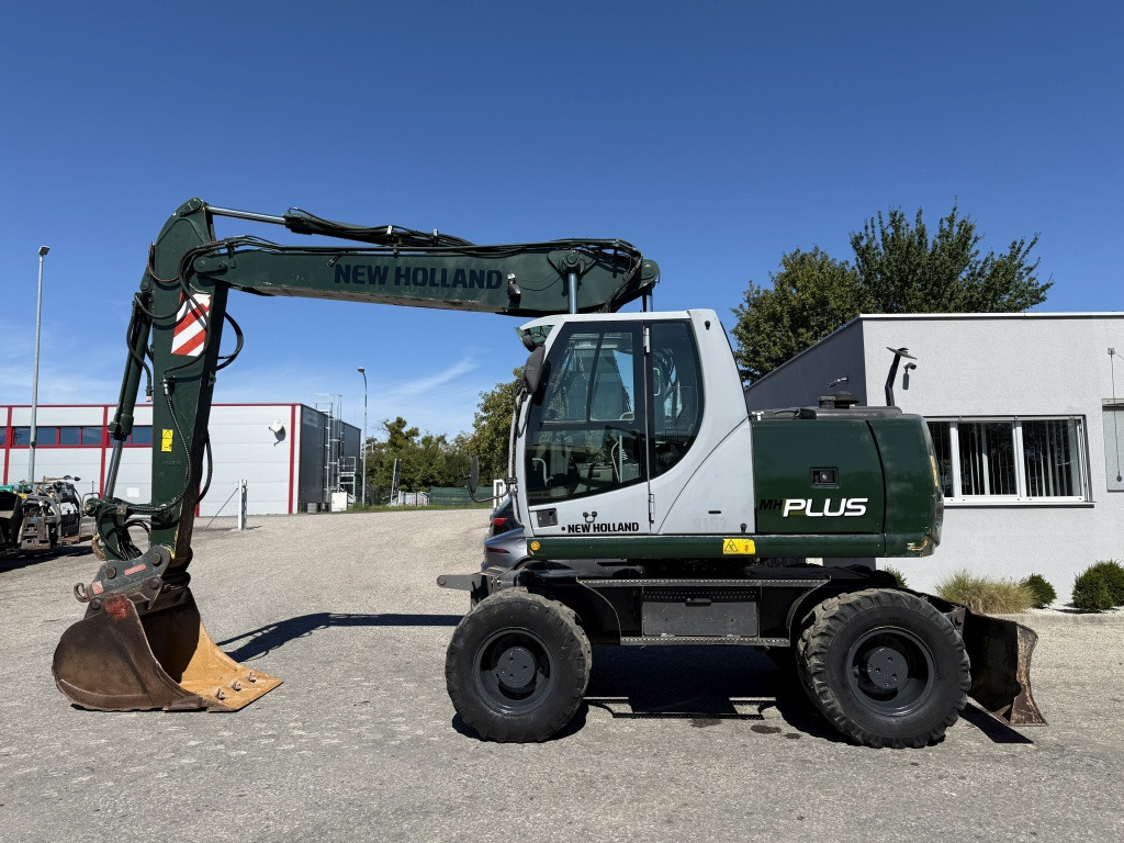 New Holland MH-Plus (111695) - Kolesové rýpadlo: obrázok 1 New Holland MH-Plus (111695) - Kolesové rýpadlo: obrázok 1