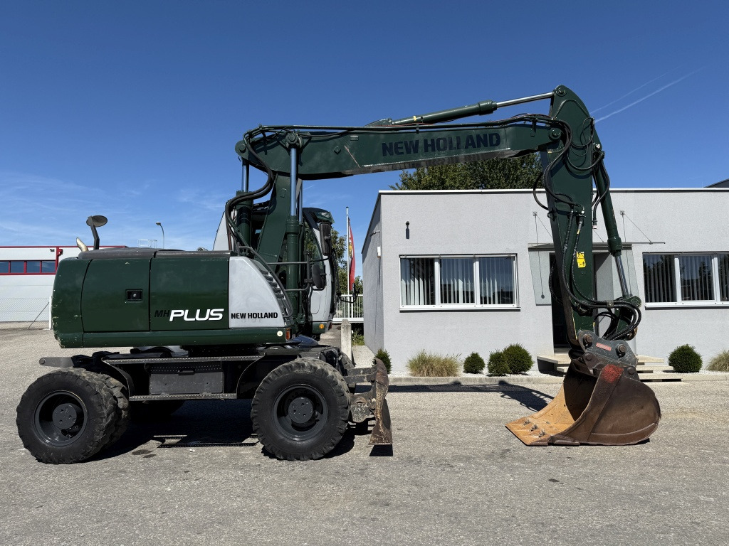 New Holland MH-Plus (111695) - Kolesové rýpadlo: obrázok 5 New Holland MH-Plus (111695) - Kolesové rýpadlo: obrázok 5