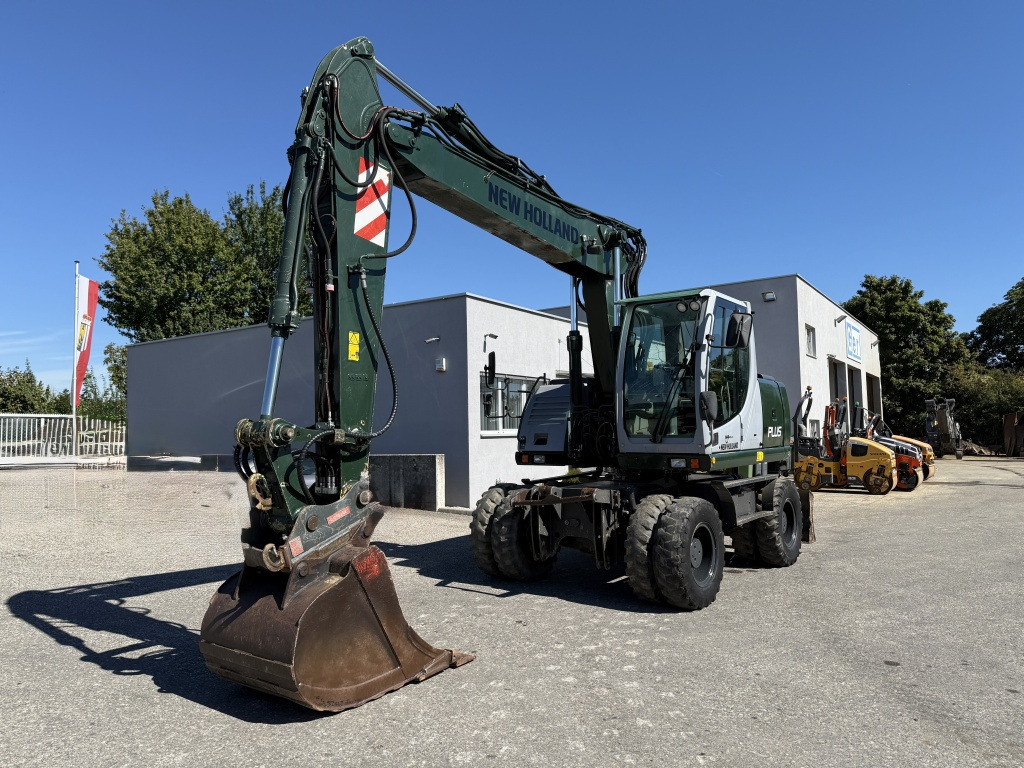 New Holland MH-Plus (111695) - Kolesové rýpadlo: obrázok 3 New Holland MH-Plus (111695) - Kolesové rýpadlo: obrázok 3