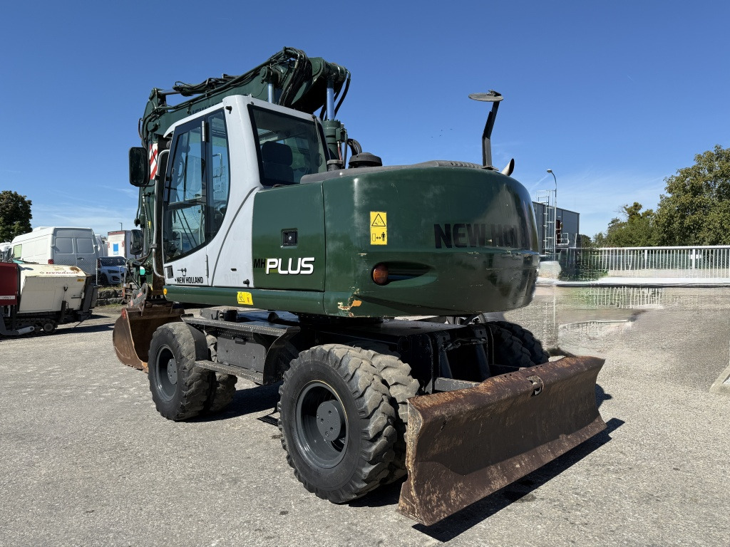 New Holland MH-Plus (111695) - Kolesové rýpadlo: obrázok 4 New Holland MH-Plus (111695) - Kolesové rýpadlo: obrázok 4