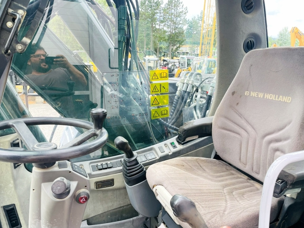 New Holland MH Plus (4054) - Kolesové rýpadlo: obrázok 5 New Holland MH Plus (4054) - Kolesové rýpadlo: obrázok 5