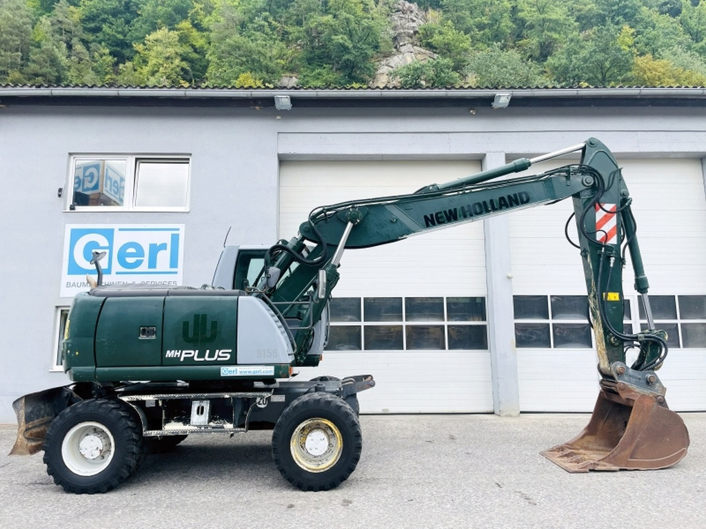 New Holland MH Plus (4054) - Kolesové rýpadlo: obrázok 2 New Holland MH Plus (4054) - Kolesové rýpadlo: obrázok 2