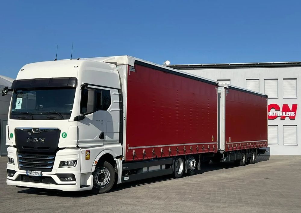 MAN TGX 26.470 z przyczepą Redos - Plachtové nákladné vozidlo, Plachtový príves: obrázok 1 MAN TGX 26.470 z przyczepą Redos - Plachtové nákladné vozidlo, Plachtový príves: obrázok 1