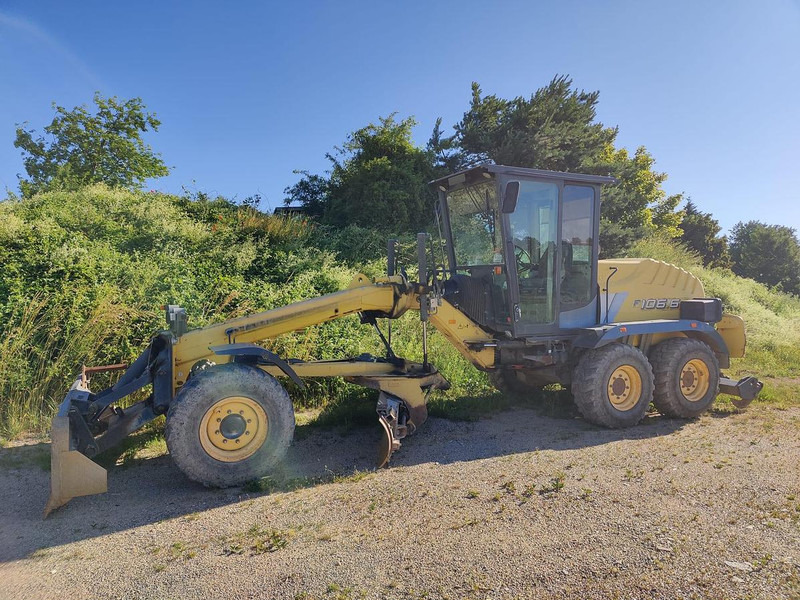 New Holland F106.6A Motorgrader - Zrovnávač: obrázok 1 New Holland F106.6A Motorgrader - Zrovnávač: obrázok 1
