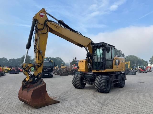 CAT M 320 F - Kolesové rýpadlo: obrázok 1 CAT M 320 F - Kolesové rýpadlo: obrázok 1
