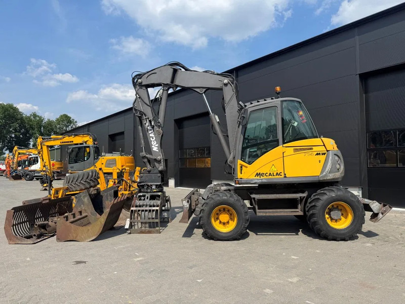 Mecalac 714MW FULL ATTACHMENTS OVERCOMPLEET !!! - Kolesové rýpadlo: obrázok 1 Mecalac 714MW FULL ATTACHMENTS OVERCOMPLEET !!! - Kolesové rýpadlo: obrázok 1