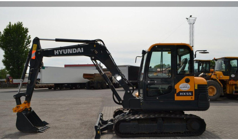 Hyundai HX55 Mini lánctalpas forgókotró - Mini rýpadlo: obrázok 5 Hyundai HX55 Mini lánctalpas forgókotró - Mini rýpadlo: obrázok 5