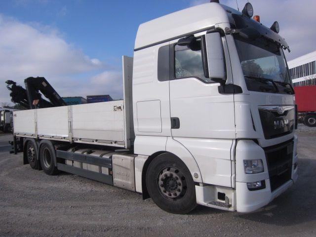 MAN TGX 26.440 mit Hiab-Kran Funkfernbedienung - Valníkový/ Plošinový nákladný automobil, Auto s hydraulickou rukou: obrázok 1 MAN TGX 26.440 mit Hiab-Kran Funkfernbedienung - Valníkový/ Plošinový nákladný automobil, Auto s hydraulickou rukou: obrázok 1