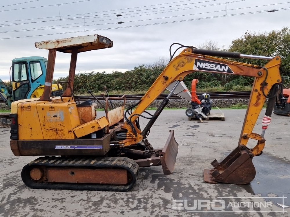 Nissan N260.2 - Mini rýpadlo: obrázok 5 Nissan N260.2 - Mini rýpadlo: obrázok 5