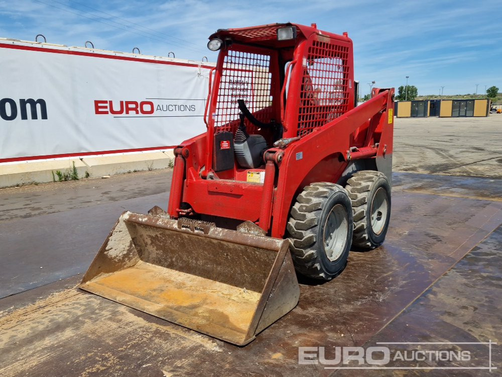 Komatsu SK-714 - Šmykom riadený nakladač: obrázok 1 Komatsu SK-714 - Šmykom riadený nakladač: obrázok 1