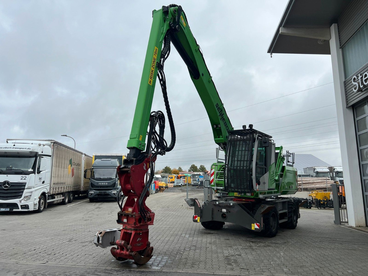 Sennebogen 718 / inkl. Vosch Fällzange / nur 1.965h! - Kolesové rýpadlo: obrázok 5 Sennebogen 718 / inkl. Vosch Fällzange / nur 1.965h! - Kolesové rýpadlo: obrázok 5