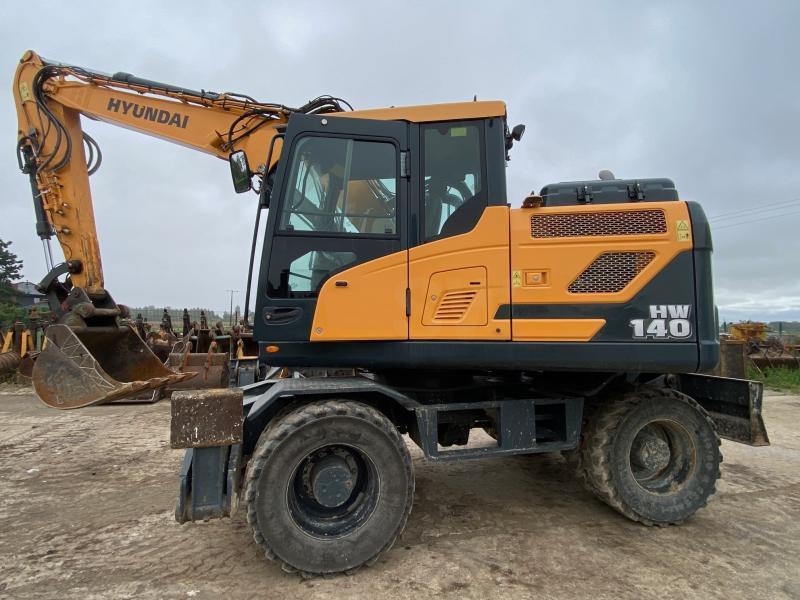 Hyundai HW 140 - Kolesové rýpadlo: obrázok 1 Hyundai HW 140 - Kolesové rýpadlo: obrázok 1