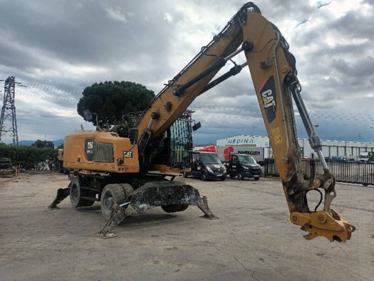 CAT MH3022-1 - Kolesové rýpadlo: obrázok 1 CAT MH3022-1 - Kolesové rýpadlo: obrázok 1