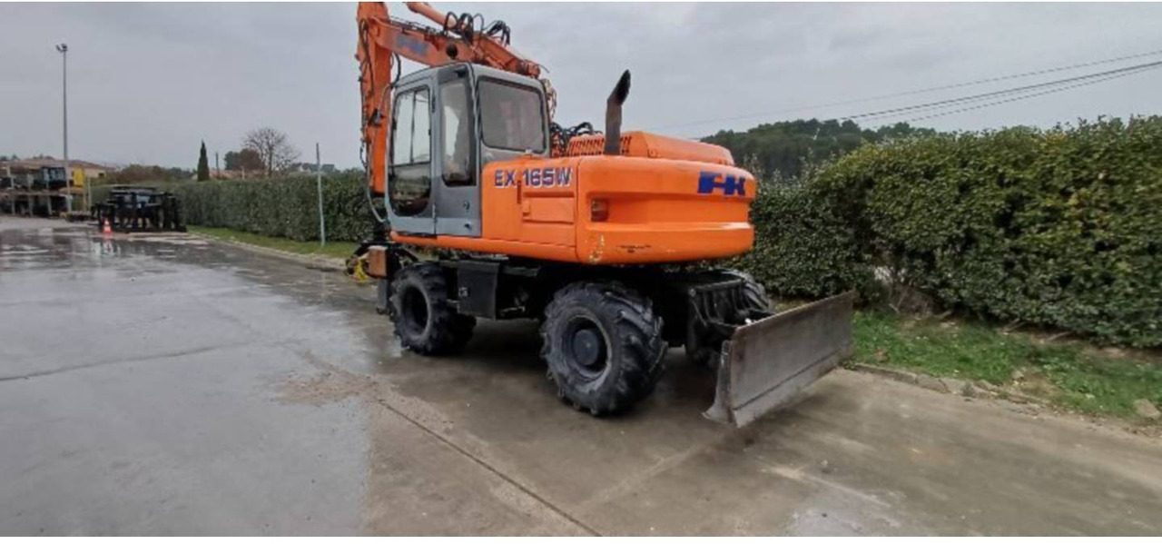 FIAT ALLIS / NEW HOLLAND EX165W - Kolesové rýpadlo: obrázok 3 FIAT ALLIS / NEW HOLLAND EX165W - Kolesové rýpadlo: obrázok 3