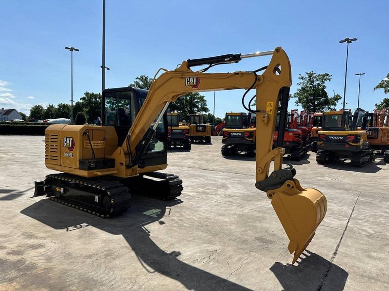 Caterpillar 305.5E2 - Pásové rýpadlo: obrázok 3 Caterpillar 305.5E2 - Pásové rýpadlo: obrázok 3