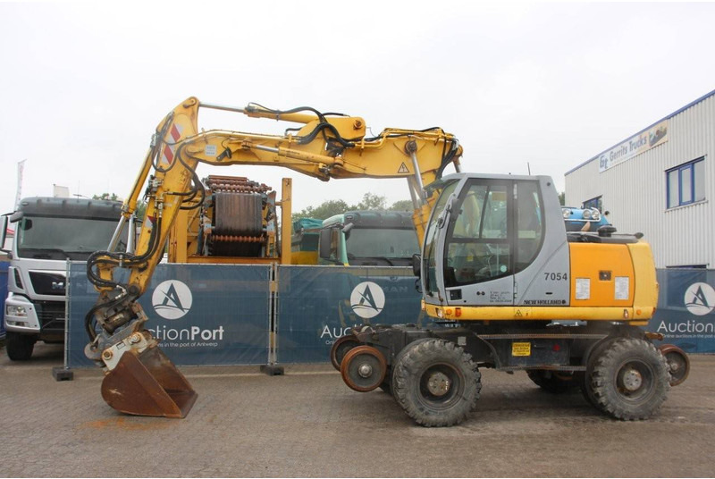 New Holland MH5 Plus - Kolesové rýpadlo: obrázok 1 New Holland MH5 Plus - Kolesové rýpadlo: obrázok 1